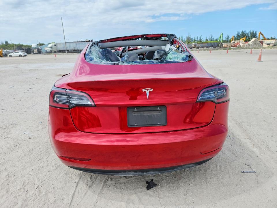 2023 Tesla Model 3 VIN 5YJ3E1EA9PF433754 COPART salvage auction — ROLLOVER, Fl - Certificate Of Destruction, sold $1,400 on 2026-07-13 (photo 6)