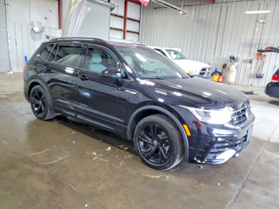 2024 Volkswagen Tiguan VIN 3VV8B7AX5RM180993 COPART salvage auction — SIDE, Ny - Mv-907A Salvage Certificate, sold $11,600 on 2026-08-22 (photo 4)