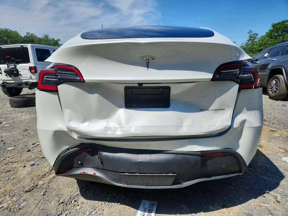 2024 Tesla Model Y VIN 7SAYGAEE4RF131149 COPART salvage auction — REAR END, Md - Cert Of Salvage > 75% Damage, sold $0 on 2026-09-18 (photo 6)