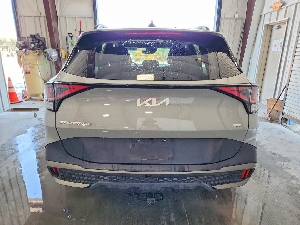 2023 Kia Sportage VIN 5XYK6CAF1PG049062 COPART salvage auction — NORMAL WEAR, Il - Certificate Of Title, sold $14,600 on 2026-07-09 (photo 6)