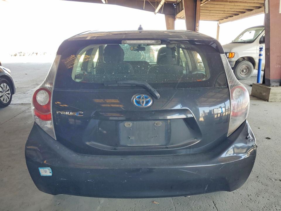 2014 Toyota Prius c VIN JTDKDTB31E1060165 COPART salvage auction — VANDALISM, CA - SALVAGE CERTIFICATE, sold $875 on 2026-07-16 (photo 6)