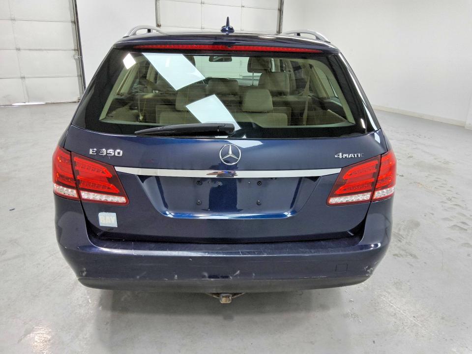 2014 Mercedes-benz E-class VIN WDDHH8JB8EB025501 COPART salvage auction — NORMAL WEAR, Wv - Certificate Of Title, sold $2,900 on 2026-07-09 (photo 6)