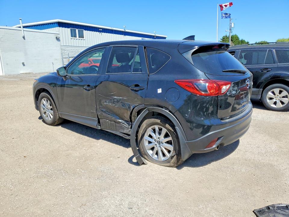 2016 Mazda Cx-5 VIN JM3KE2CY9G0880771 COPART salvage auction — SIDE, On - Permit No Brand - Unfit, sold $6,000 on 2026-07-09 (photo 2)