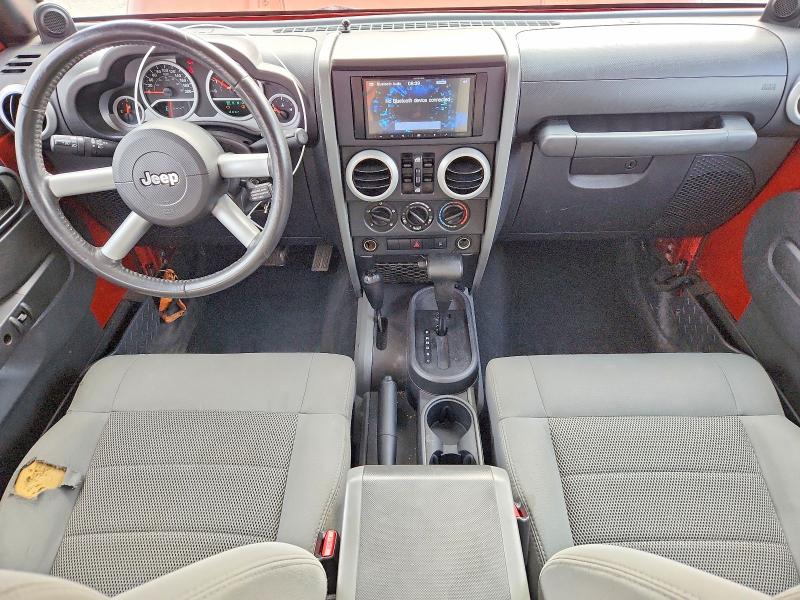 2009 Jeep Wrangler unlimited VIN 1J4GA59149L731962 COPART salvage auction — FRONT END, ON - PERMIT SALVAGE, sold $1,800 on 2026-07-28 (photo 8)