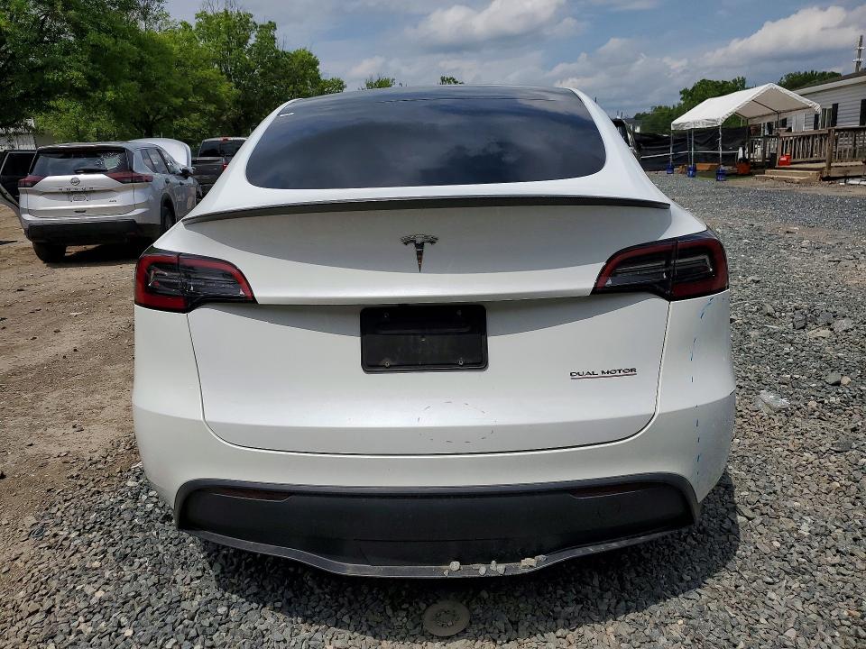 2023 Tesla Model y VIN 7SAYGDEF7PF788423 COPART salvage auction — REAR END, Salvage Title, sold $13,500 on 2026-07-23 (photo 6)