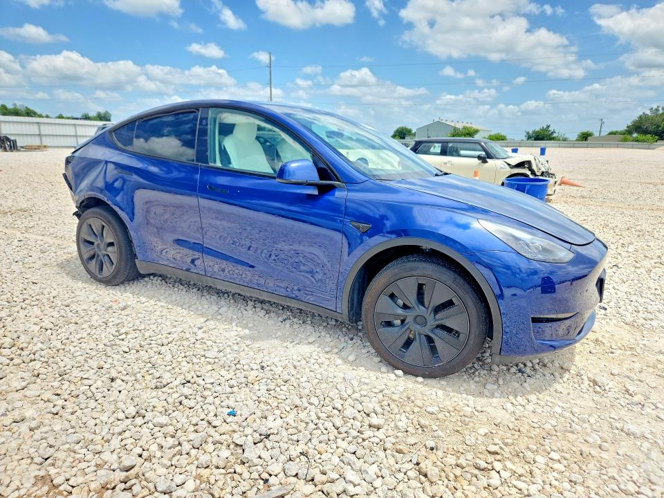 2024 Tesla VIN 7SAYGDEE9RA333290 COPART salvage auction — REAR END, TX - SALVAGE VEHICLE TITLE (P), sold $2,200 on 2026-07-30 (photo 4)