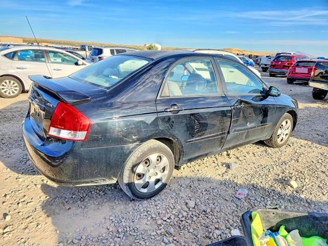 2009 Kia Spectra VIN KNAFE222395593193 COPART salvage auction — SIDE, Ut - Salvage Certificate, sold $700 on 2026-07-10 (photo 3)