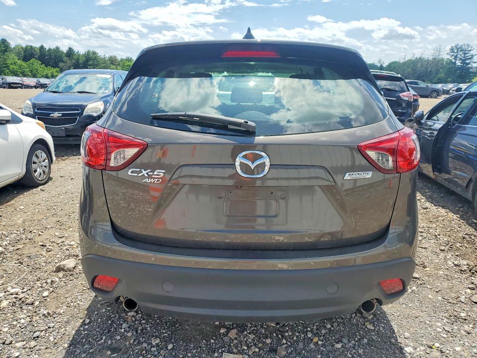 2016 Mazda VIN JM3KE4BY1G0751680 COPART salvage auction — SIDE, Md - Cert Of Salvage > 75% Damage, sold $2,000 on 2026-07-27 (photo 6)
