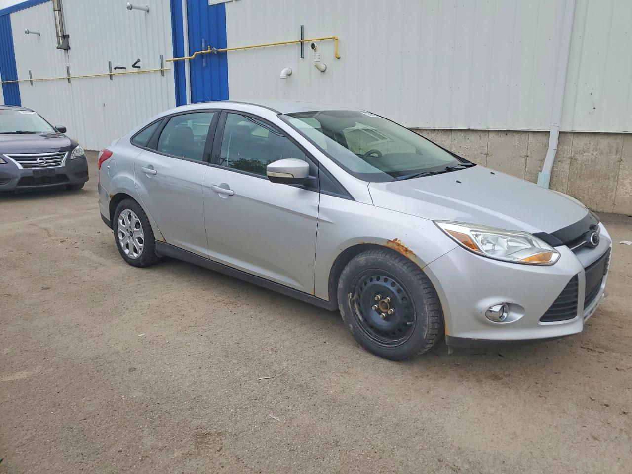 2012 Ford Focus VIN 1FAHP3F2XCL368476 COPART salvage auction — Rear End, St - Salvage Title, sold $325 on 2026-07-09 (photo 4)