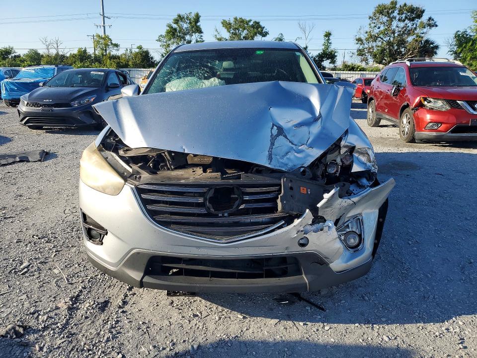 2016 Mazda Cx-5 VIN JM3KE2CYXG0760056 COPART salvage auction — FRONT END, Fl - Certificate Of Title, sold $1,200 on 2026-07-10 (photo 5)