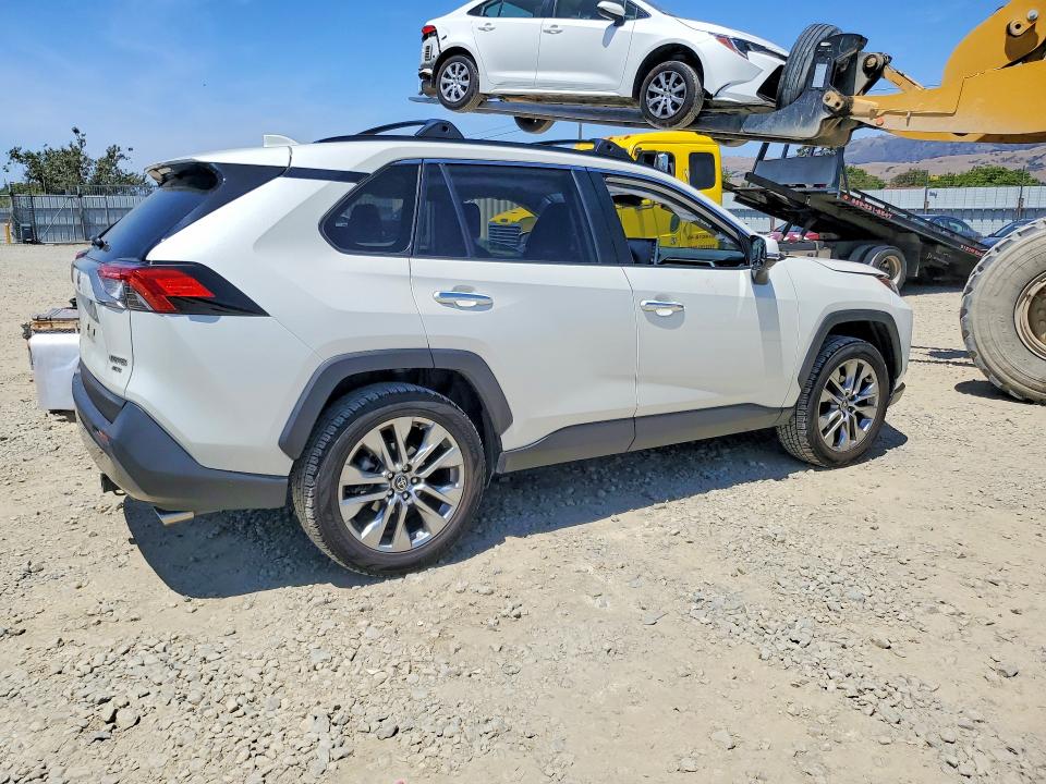 2022 Toyota Rav 4 VIN JTMN1RFV9ND086452 COPART salvage auction — SIDE, Ca - Salvage Certificate, sold $13,300 on 2026-07-14 (photo 3)