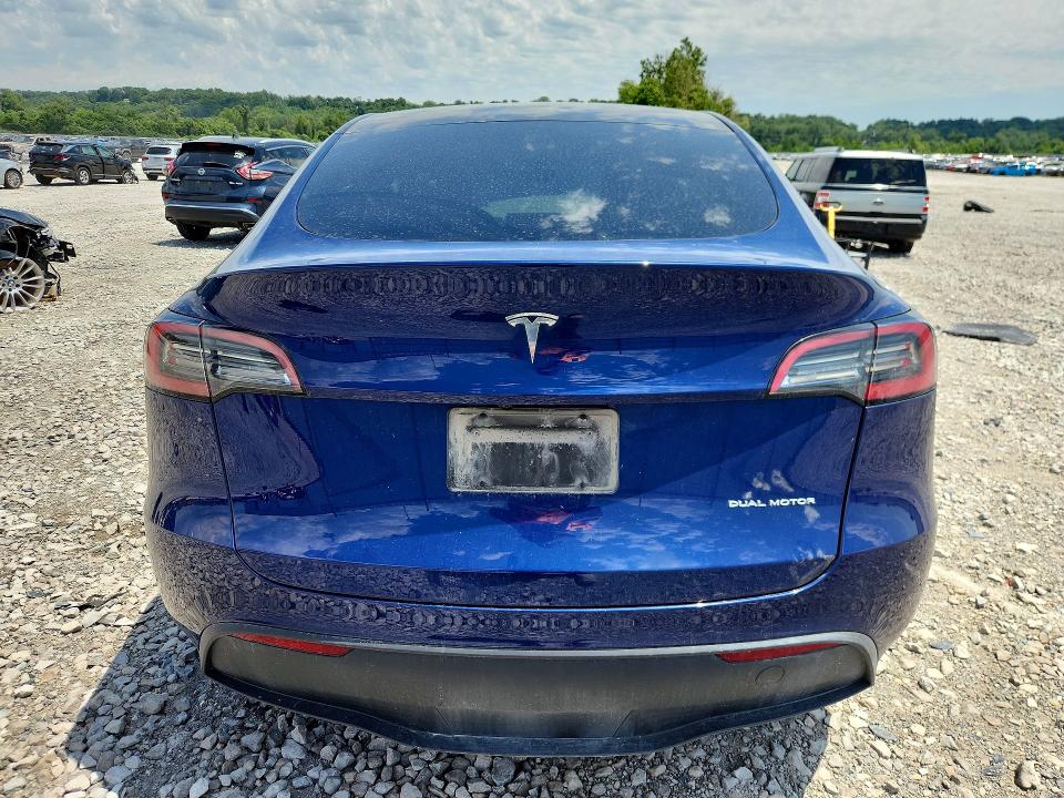 2023 Tesla Model y VIN 7SAYGDEE0PA192655 COPART salvage auction — FRONT END, IL - SALVAGE CERTIFICATE, sold $5,000 on 2026-07-27 (photo 6)