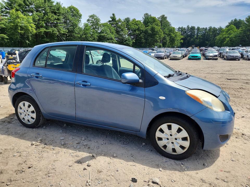 2011 Toyota Yaris VIN JTDKT4K30B5334954 COPART salvage auction — SIDE, Ma - Cert Of Title-Reconstrctd Coll, sold $825 on 2026-07-06 (photo 4)