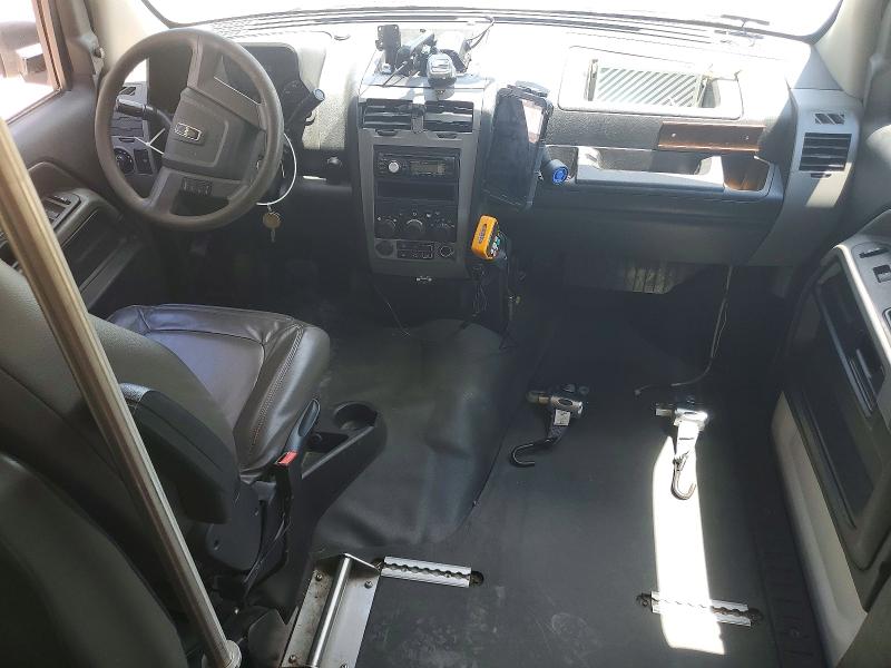 2014 Am general Mv-1 VIN 57WMD2A66EM101883 COPART salvage auction — MINOR DENT/SCRATCHES, NC - CERTIFICATE OF TITLE, sold $1,050 on 2026-07-06 (photo 8)