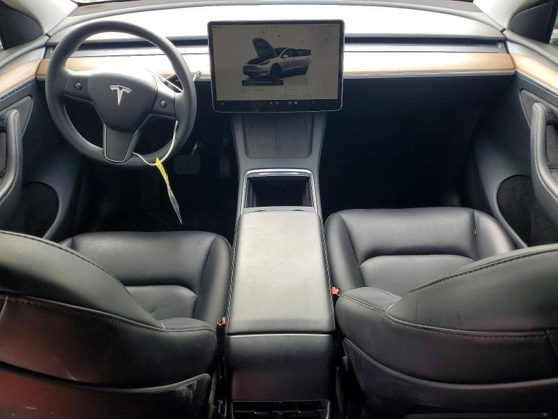 2023 Tesla Model y VIN 7SAYGAEE1PF881184 COPART salvage auction — REAR END, Ca - Salvage Certificate, sold $14,400 on 2026-07-29 (photo 8)