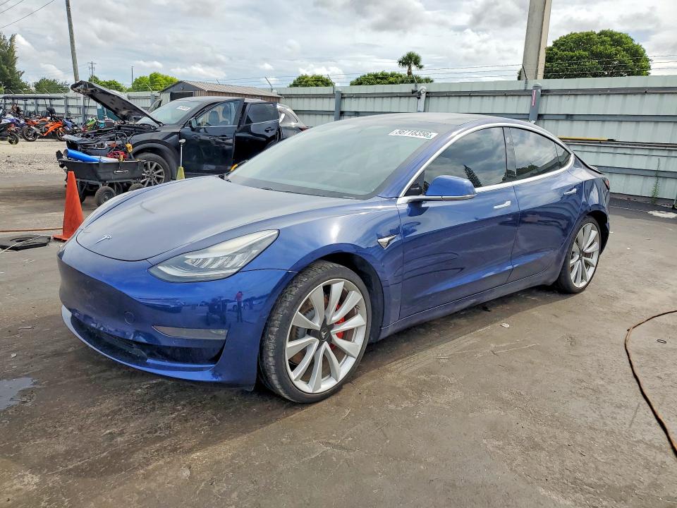 2019 Tesla Model 3 VIN 5YJ3E1EB8KF237774 COPART salvage auction — REAR END, Fl - Cert Of Title Slvg Rebuildable, sold $5,500 on 2026-07-08 (photo 1)