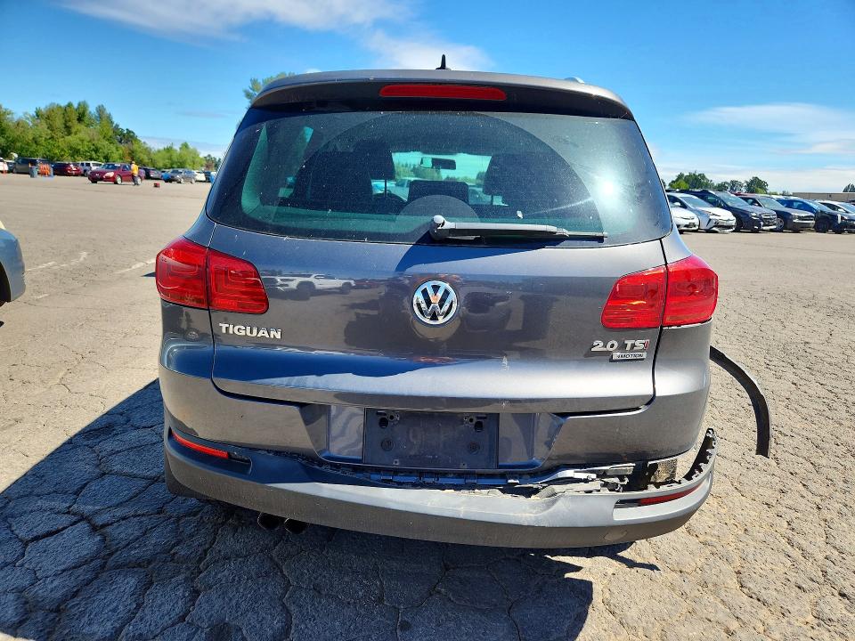2014 Volkswagen Tiguan VIN WVGBV3AX7EW559231 COPART salvage auction — REAR END, Or - Salvage Title Certificate, sold $1,450 on 2026-07-27 (photo 6)