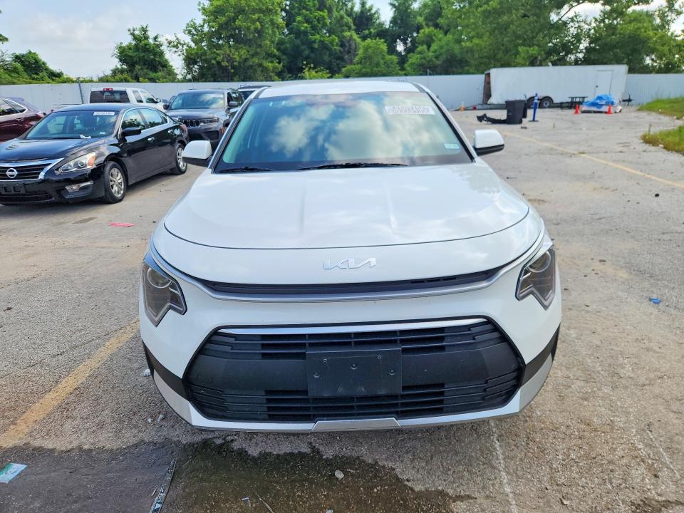 2026 Kia Niro VIN KNDCP3LE0T5329175 COPART salvage auction — SIDE, Tx - Certificate Of Title, sold $10,700 on 2026-07-08 (photo 5)