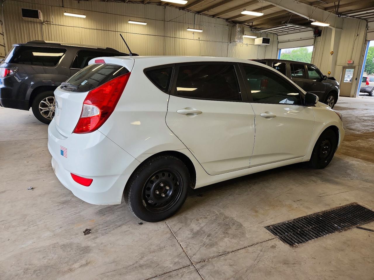 2016 Hyundai Accent VIN KMHCT5AEXGU241350 COPART salvage auction — Rear End, MN - CERT OF TITLE-PR SALV FLOOD, sold $725 on 2026-07-07 (photo 3)