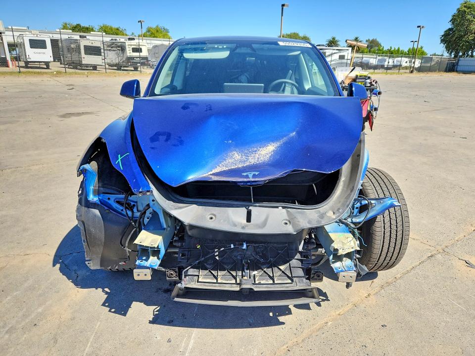 2024 Tesla Model y VIN 7SAYGDED7RF127122 COPART salvage auction — FRONT END, Ca - Salvage Certificate, sold $12,700 on 2026-07-13 (photo 5)
