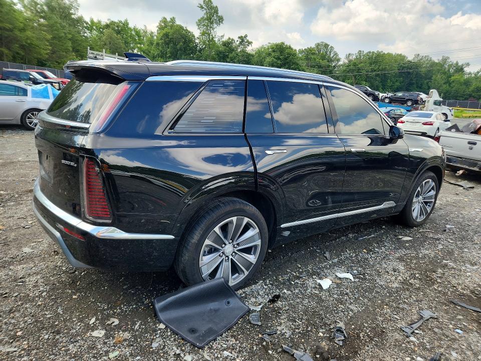 2026 Cadillac Xt4 VIN 1GYC3KML8TZ701349 COPART salvage auction — SIDE, Id - Salvage Certificate Of Title, sold $25,750 on 2026-08-14 (photo 3)