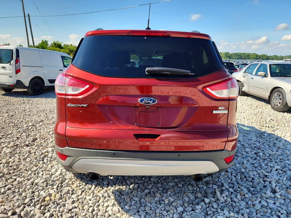 2016 Ford Escape VIN 1FMCU0GX0GUB35885 COPART salvage auction — MINOR DENT/SCRATCHES, MI - DEALER ONLY CLEAN TITLE, sold $525 on 2026-07-02 (photo 6)