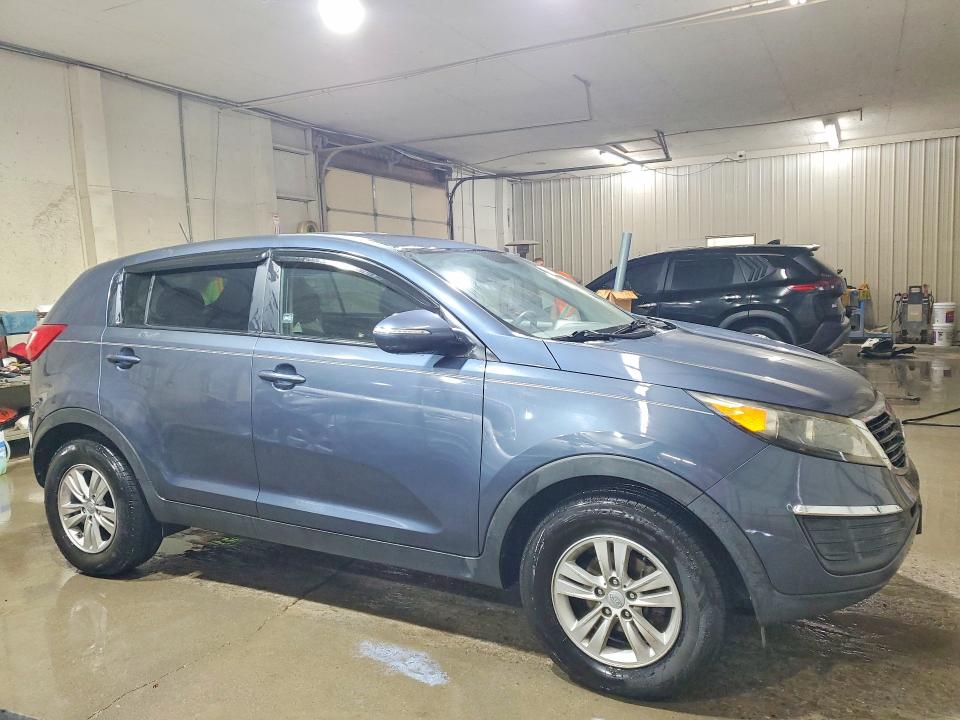 2011 Kia Sportage VIN KNDPB3A23B7048886 COPART salvage auction — SIDE, Tn - Salvage Certificate, sold $2,400 on 2026-07-09 (photo 4)