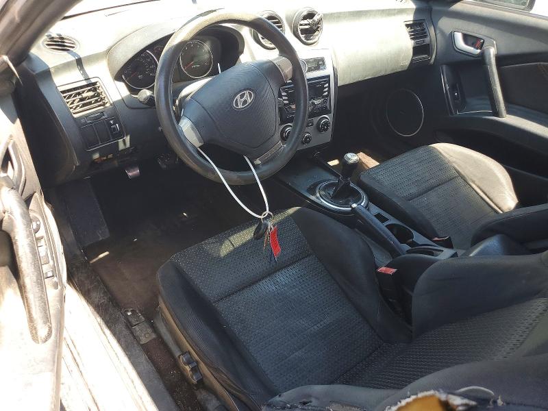 2007 Hyundai Tiburon VIN KMHHM66D17U243934 COPART salvage auction — FRONT END, Tx - Salvage Vehicle Title, sold $275 on 2026-07-10 (photo 8)