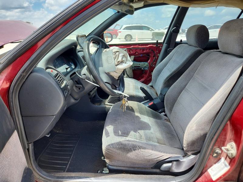 1995 Geo Prizm VIN 1Y1SK5281SZ060656 COPART salvage auction — FRONT END, TX - SALVAGE VEHICLE TITLE (P), sold $70 on 2026-07-16 (photo 7)