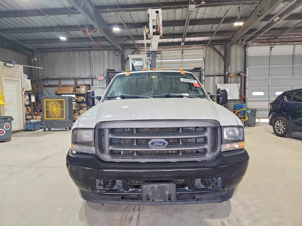 2004 Ford F-350 super duty VIN 1FDWF36L24EC52168 COPART salvage auction — HAIL, Mo - Salvage Certificate Of Title, sold $2,700 on 2026-07-09 (photo 5)