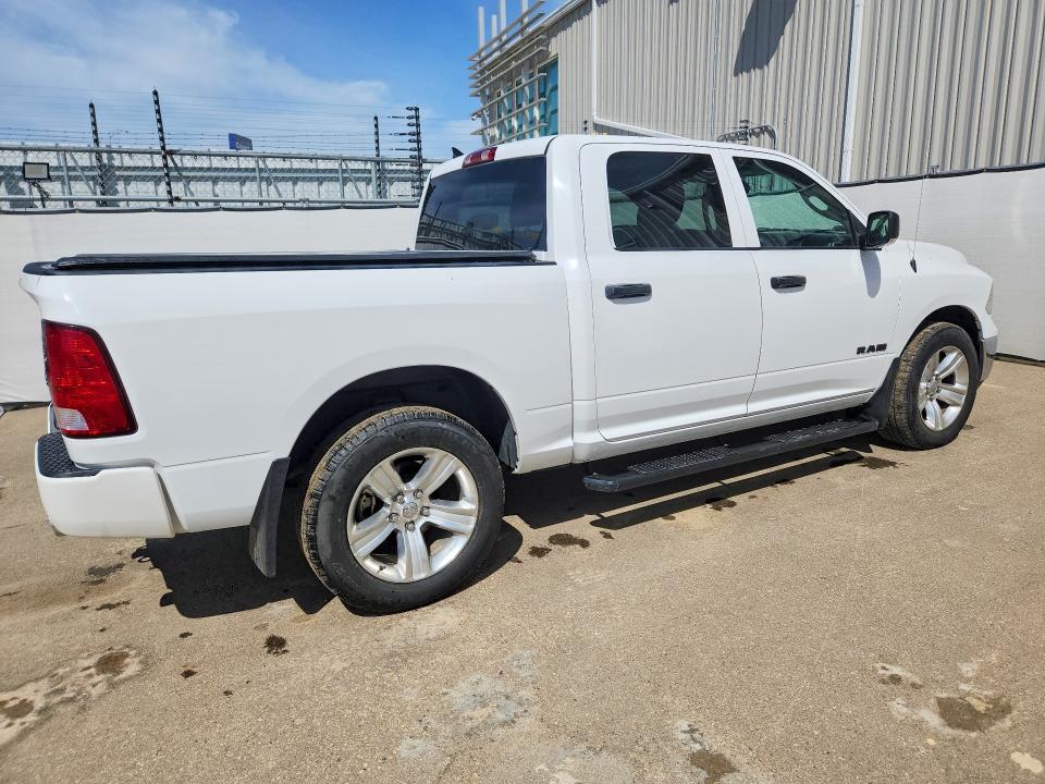 2021 Ram 1500 VIN 1C6RR7KG9MS518805 COPART salvage auction — MINOR DENT/SCRATCHES, AB - BOS - ACTIVE, sold $10,100 on 2026-07-29 (photo 3)