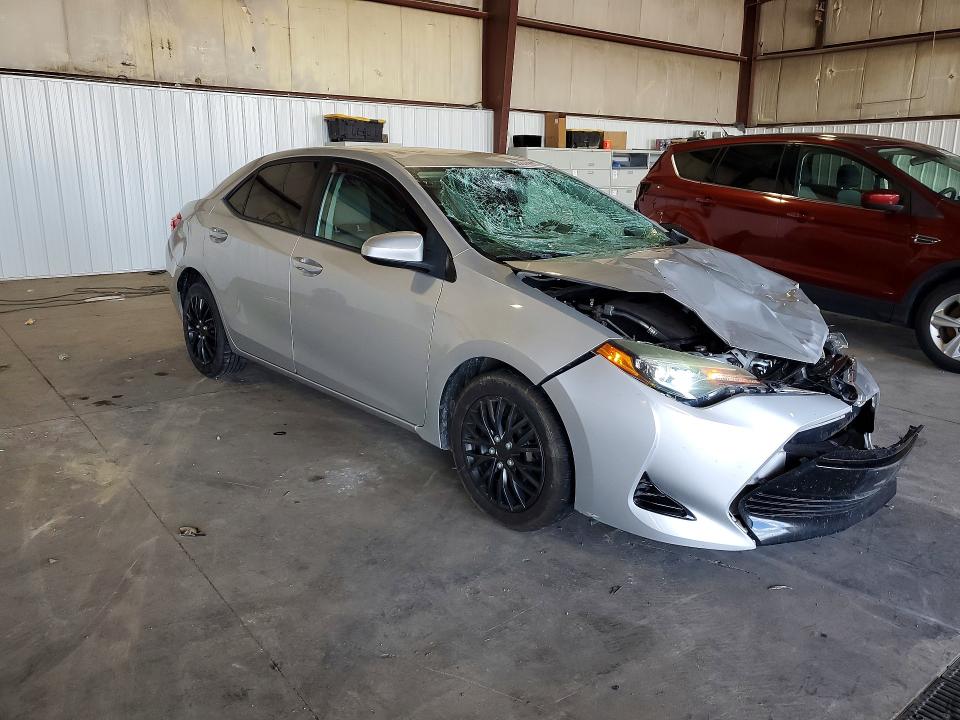 2017 Toyota Corolla VIN 5YFBURHE7HP699047 COPART salvage auction — WATER/FLOOD, IA - CERT OF TITLE-SALVAGE TITLE, sold $2,250 on 2026-07-22 (photo 4)