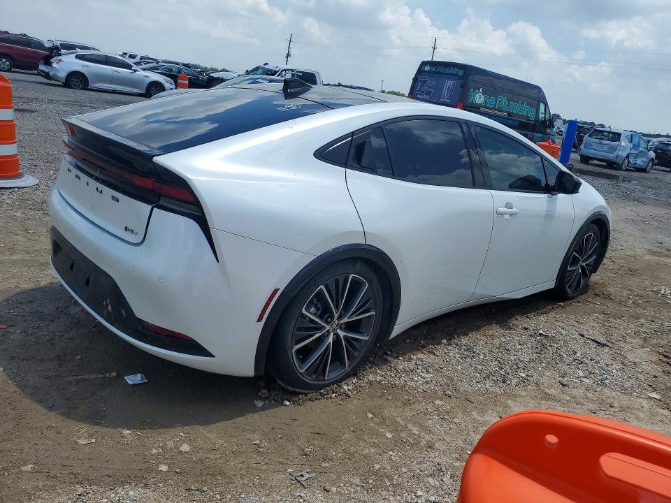 2023 Toyota Prius VIN JTDACAAU0P3011687 COPART salvage auction — SIDE, TX - SALVAGE VEHICLE TITLE (P), sold $7,000 on 2026-07-23 (photo 3)