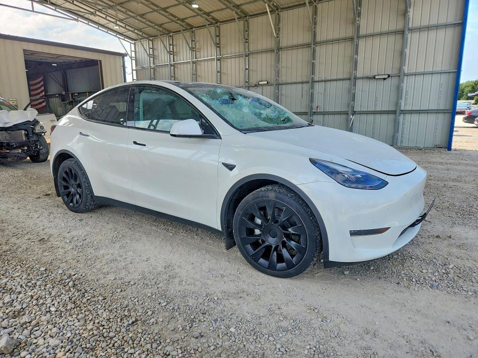 2023 Tesla Model y VIN 7SAYGDEE3PA207780 COPART salvage auction — HAIL, MO - SALVAGE CERTIFICATE OF TITLE, sold $12,800 on 2026-07-27 (photo 4)