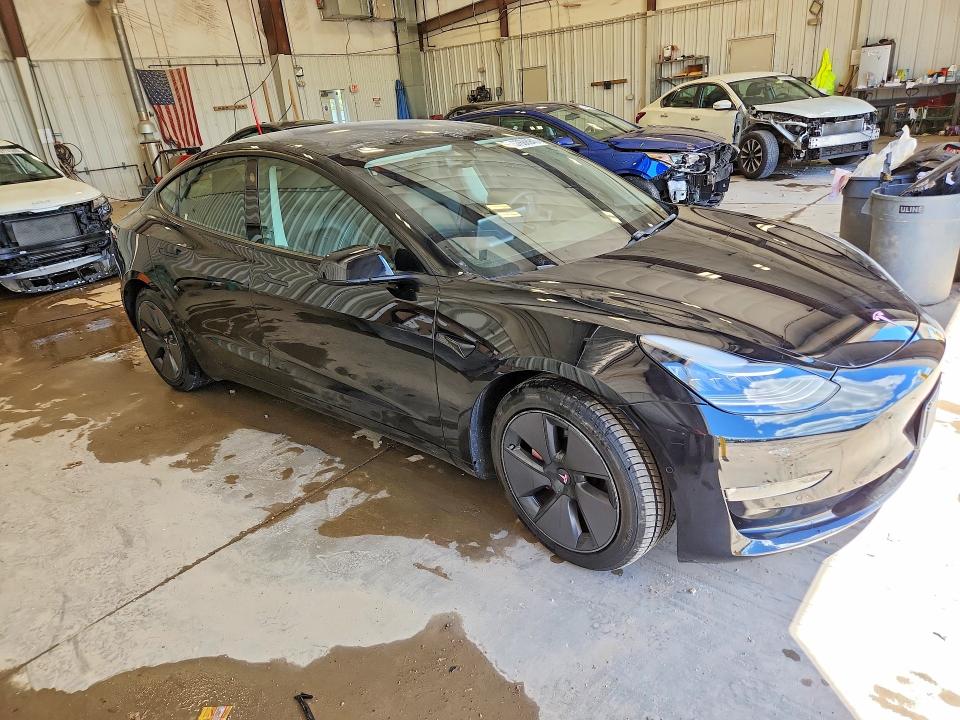 2021 Tesla Model 3 VIN 5YJ3E1EB5MF855220 COPART salvage auction — SIDE, Wi - Cert Of Title-Salvage Vehicle, sold $8,600 on 2026-07-06 (photo 4)