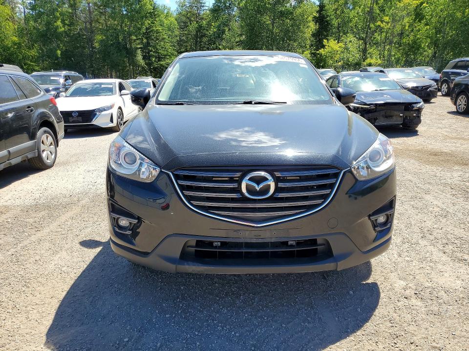 2016 Mazda Cx-5 VIN JM3KE2CY9G0880771 COPART salvage auction — SIDE, On - Permit No Brand - Unfit, sold $6,000 on 2026-07-09 (photo 5)