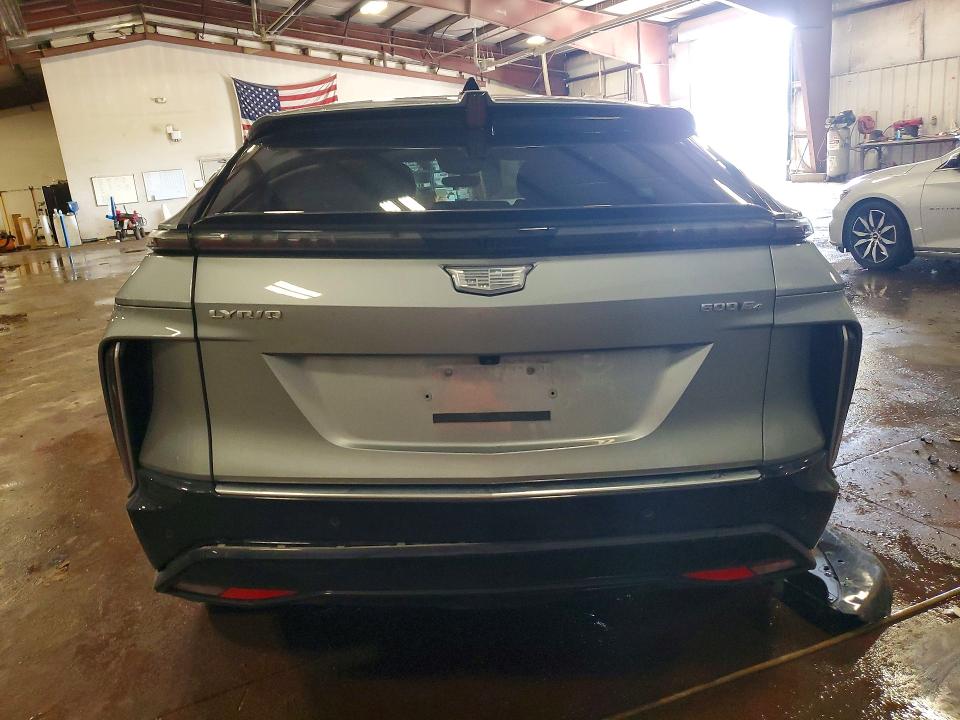 2025 Cadillac Lyriq VIN 1GYKPRRL1SZ319129 COPART salvage auction — FRONT END, Mi - Dlr/Dis/Exp-Ct Others-Ca Acq, sold $12,600 on 2026-08-14 (photo 6)