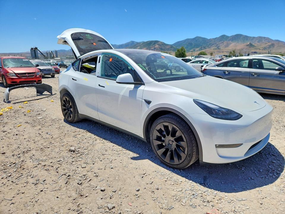 2025 Tesla Model y VIN 7SAYGDEEXSF248757 COPART salvage auction — REAR END, Ut - Salvage Certificate, sold $14,200 on 2026-07-31 (photo 4)