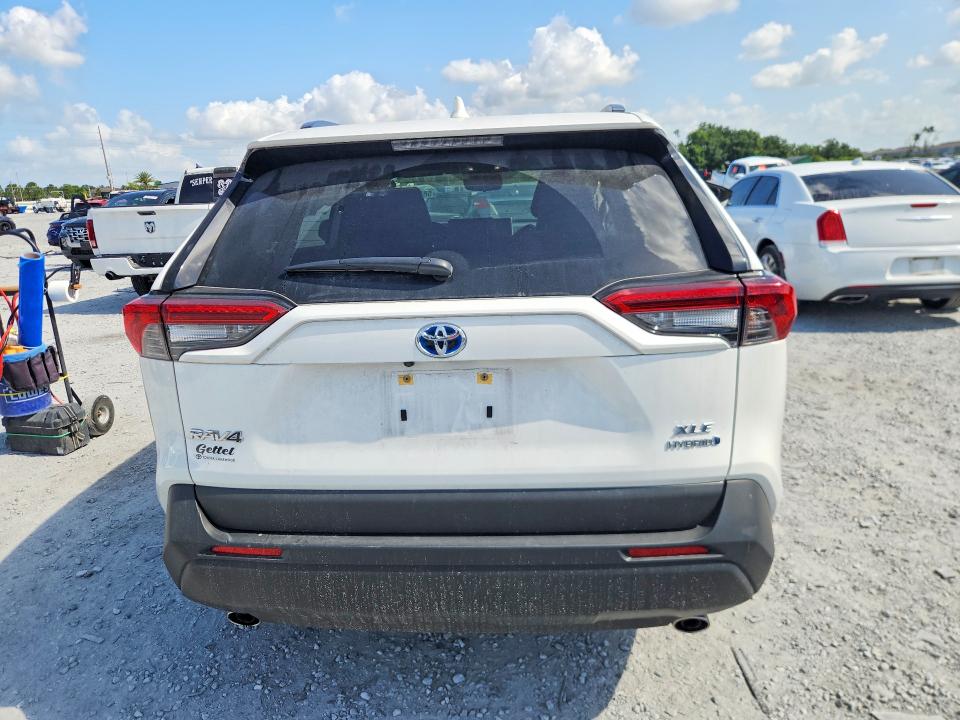 2024 Toyota Rav 4 VIN JTMRWRFV6RD261605 COPART salvage auction — SIDE, Fl - Cert Of Title Slvg Rebuildable, sold $15,600 on 2026-07-10 (photo 6)