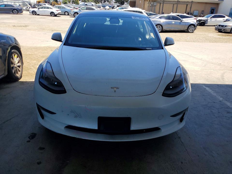 2023 Tesla VIN 5YJ3E1EB8PF388444 COPART salvage auction — REAR END, CA - SALVAGE CERTIFICATE, sold $8,500 on 2026-07-02 (photo 5)
