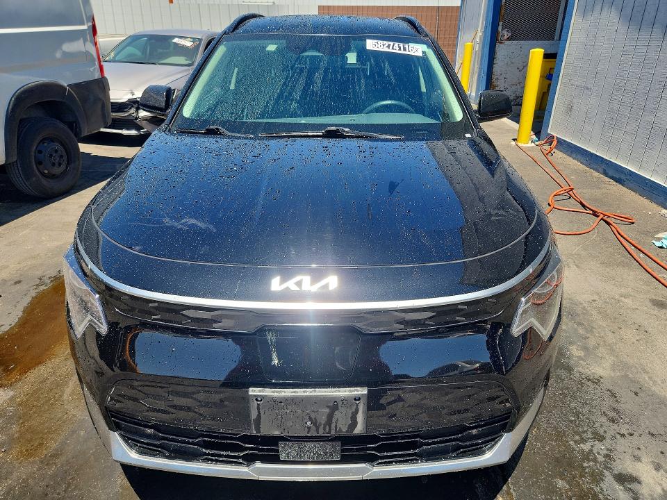 2023 Kia Niro VIN KNDCR3L14P5035937 COPART salvage auction — SIDE, Nv - Salvage Title, sold $8,400 on 2026-07-20 (photo 5)