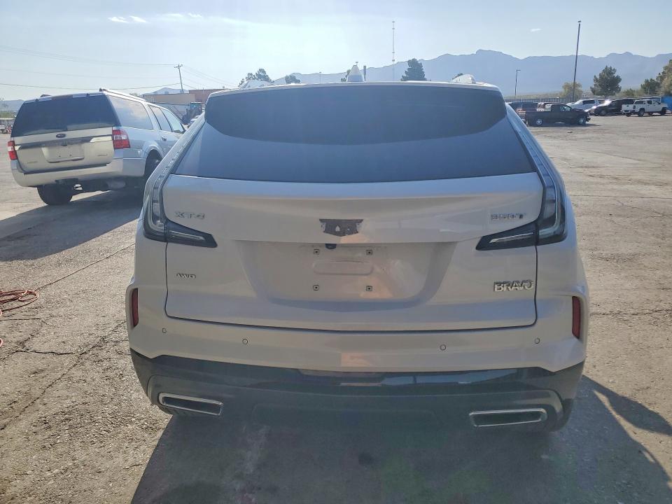 2024 Cadillac Xt4 VIN 1GYFZFR40RF159100 COPART salvage auction — SIDE, Tx - Salvage Vehicle Title, sold $15,300 on 2026-07-31 (photo 6)