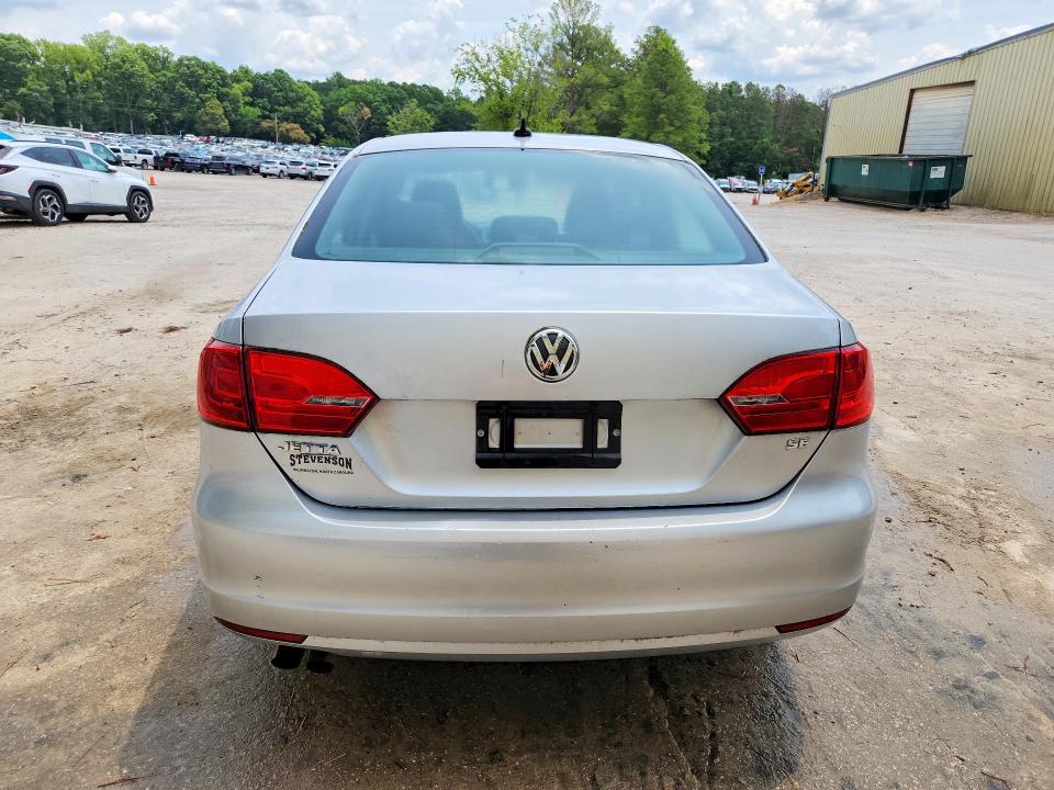 2014 Volkswagen Jetta VIN 3VWD17AJ4EM289447 COPART salvage auction — MINOR DENT/SCRATCHES, Nc - Dealer Only Clean Title (P), sold $2,050 on 2026-07-09 (photo 6)