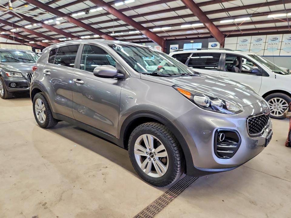 2018 Kia Sportage VIN KNDPMCAC1J7359511 COPART salvage auction — MINOR DENT/SCRATCHES, In - Certificate Of Title, sold $5,300 on 2026-07-27 (photo 4)