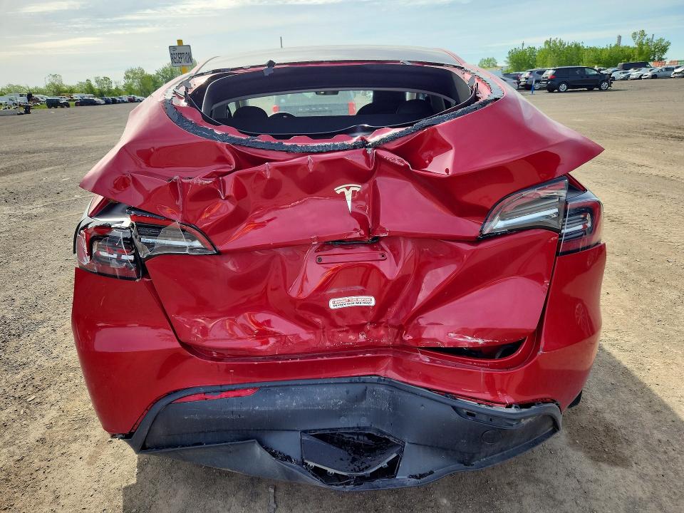 2023 Tesla Model y VIN LRWYGDFDXPC966569 COPART salvage auction — REAR END, Qc - Gravement Accidente, sold $7,600 on 2026-07-07 (photo 6)