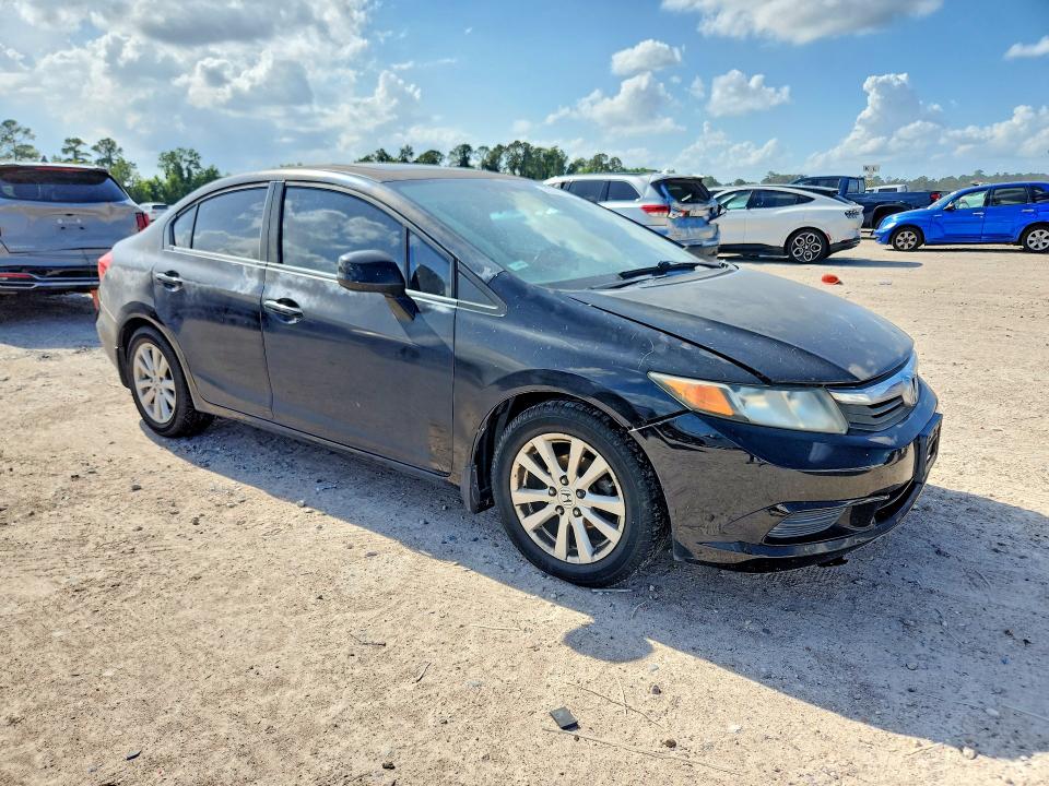 2012 Honda Civic VIN 2HGFB2F95CH540452 COPART salvage auction — WATER/FLOOD, Tx - Salvage Title-Flood Damage, sold $625 on 2026-07-02 (photo 4)