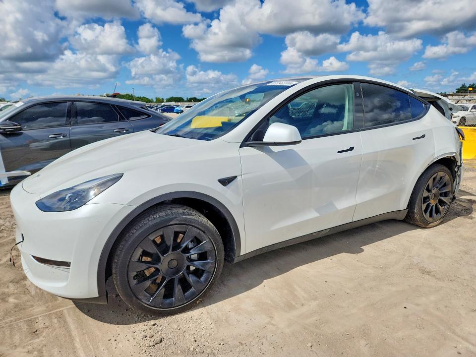2024 Tesla Model y VIN 7SAYGDED0RF041831 COPART salvage auction — REAR END, Fl - Cert Of Title Slvg Rebuildable, sold $7,700 on 2026-07-15 (photo 1)