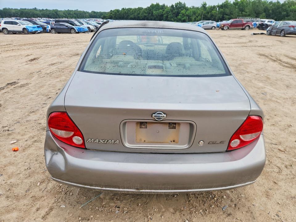 2001 Nissan Maxima VIN JN1CA31D61T818770 COPART salvage auction — SIDE, Fl - Cert Of Title Slvg Rebuildable, sold $300 on 2026-07-17 (photo 6)