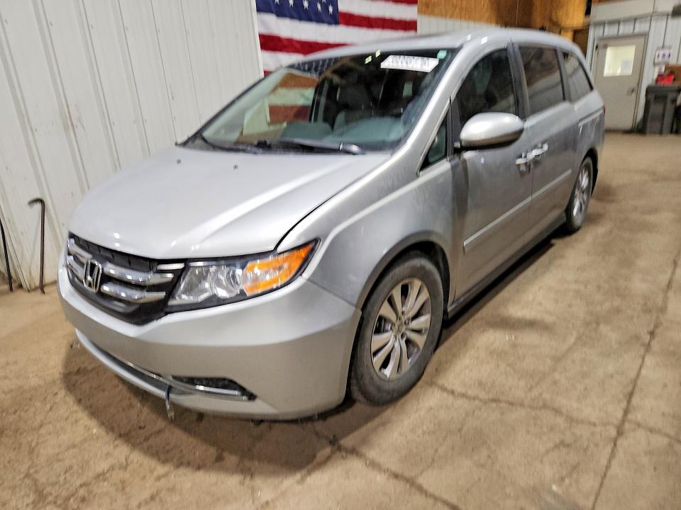 2014 Honda Odyssey VIN 5FNRL5H64EB080237 COPART salvage auction — FRONT END, AK - CERT OF VEH TITLE-RECONSTRUCTE, sold $750 on 2026-07-21 (photo 1)