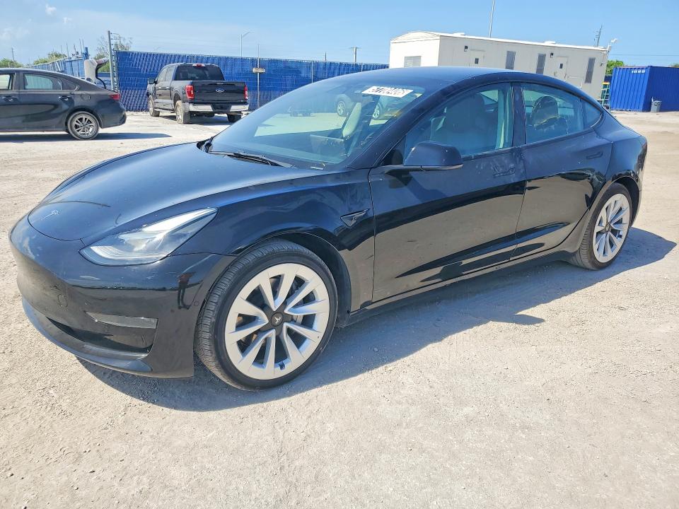 2022 Tesla Model 3 VIN 5YJ3E1EA6NF372439 COPART salvage auction — REAR END, Fl - Certificate Of Title, sold $15,700 on 2026-07-06 (photo 1)